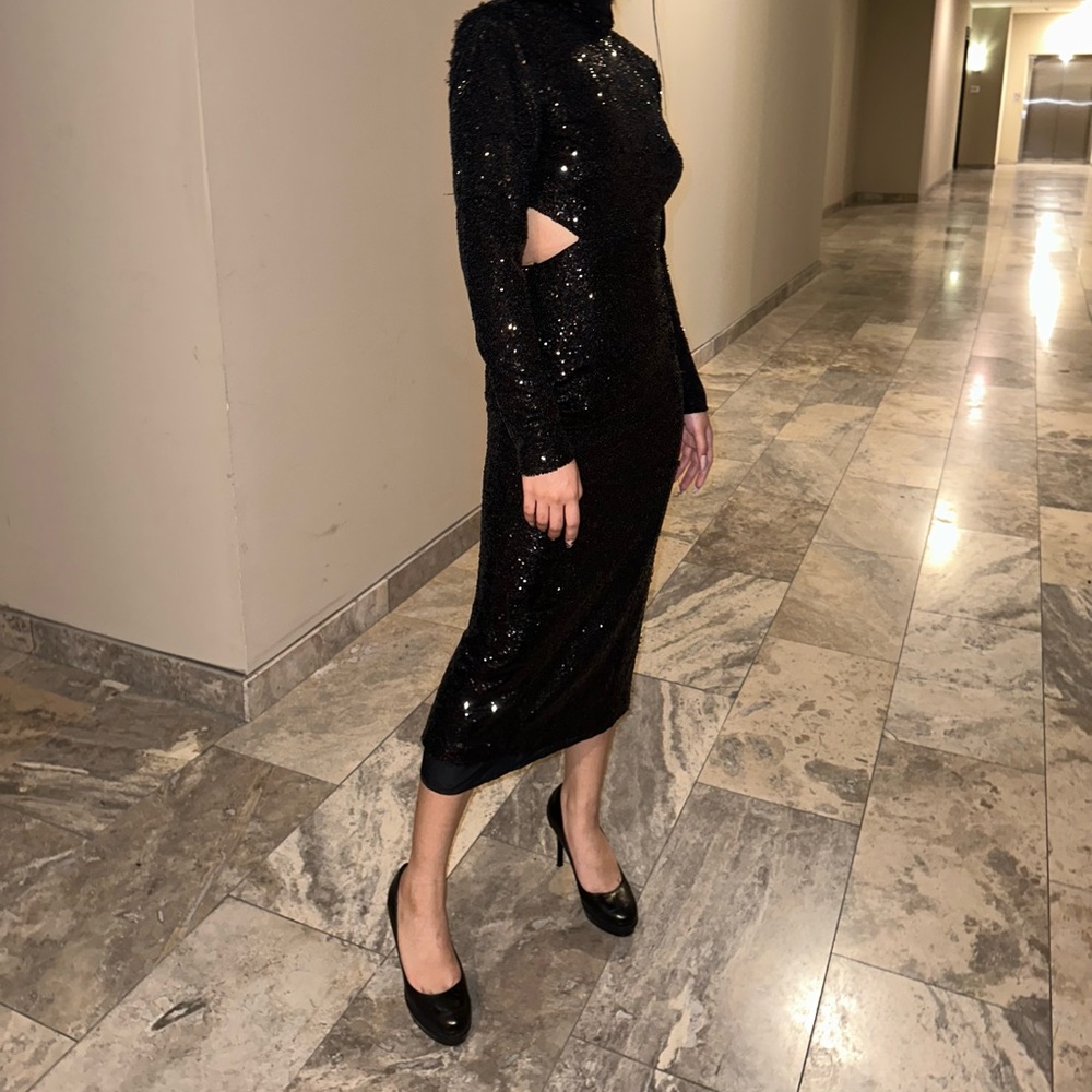 Black sequins gown size 0, snag areas